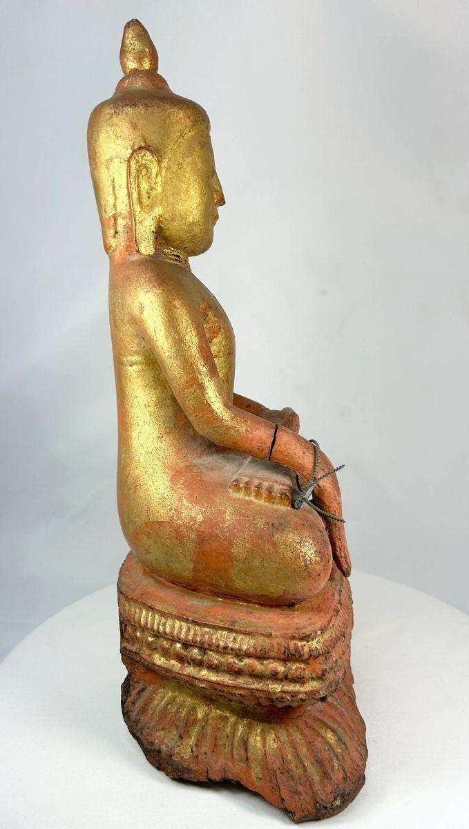 Large antique Burmese wooden monk statue with original lacquer and gilt, 19th century