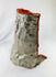 Authentic flown NASA Space Shuttle insulation blanket made of fibrous silica batting with reflective silver thermal surface and orange edge seal, used in the Orbiter Thermal Protection System (TPS), stamped April 1983 with serial number and manufacturer code visible on the metal tag, approximately 11 by 10 inches, aerospace artifact from the Space Shuttle Program.