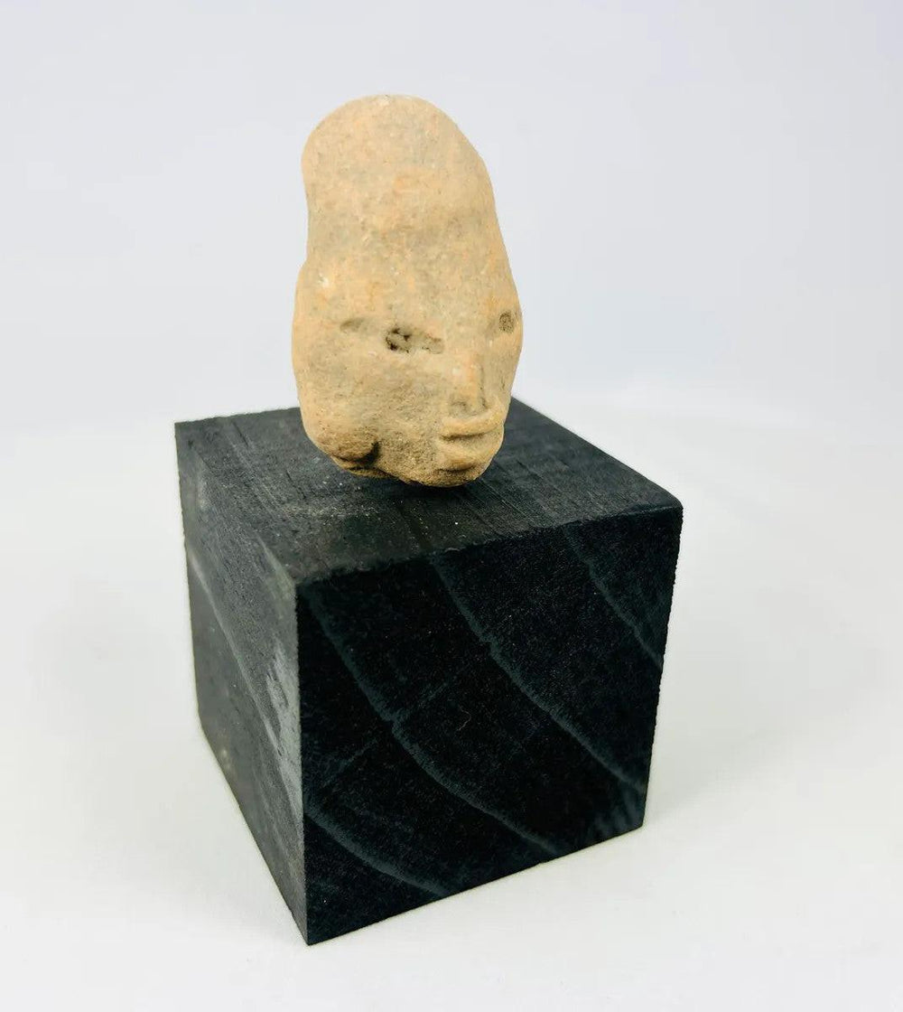 Detail of sculpted facial modeling on an ancient Mesoamerican terracotta head