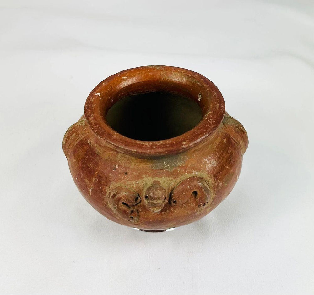 Late Pre-Columbian terracotta ritual vessel featuring molded decoration and sculptural form
