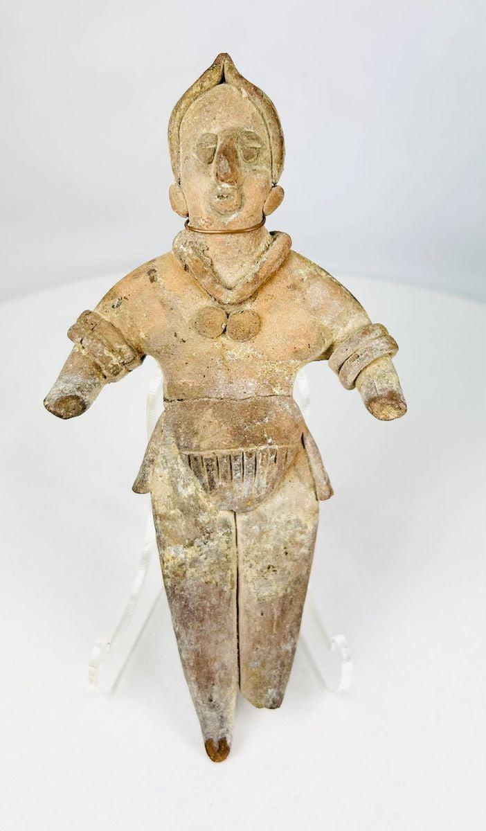Museum-quality Mesoamerican terracotta figurine photographed against a neutral background
