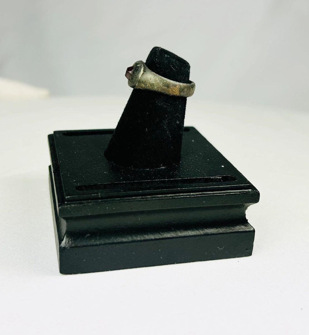 Sassanian silver ring featuring engraved carnelian gemstone seal