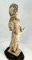 Low-fired terracotta Tang Dynasty tomb figure with serene expression and mineral burial patina