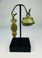 Museum-quality Ancient Roman bronze pendant photographed against a neutral background