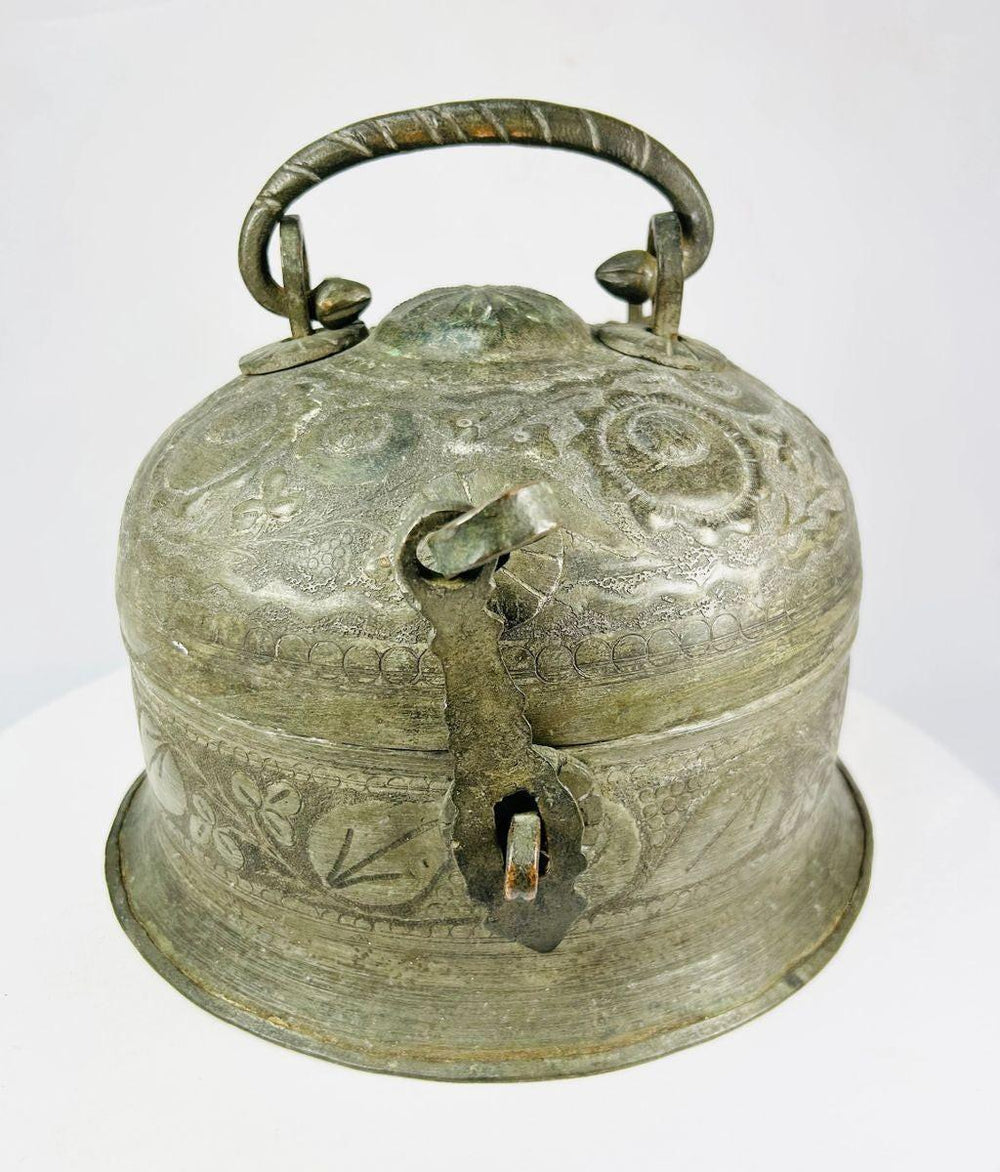 Close-up of antique Indo-Persian censer with aged patina