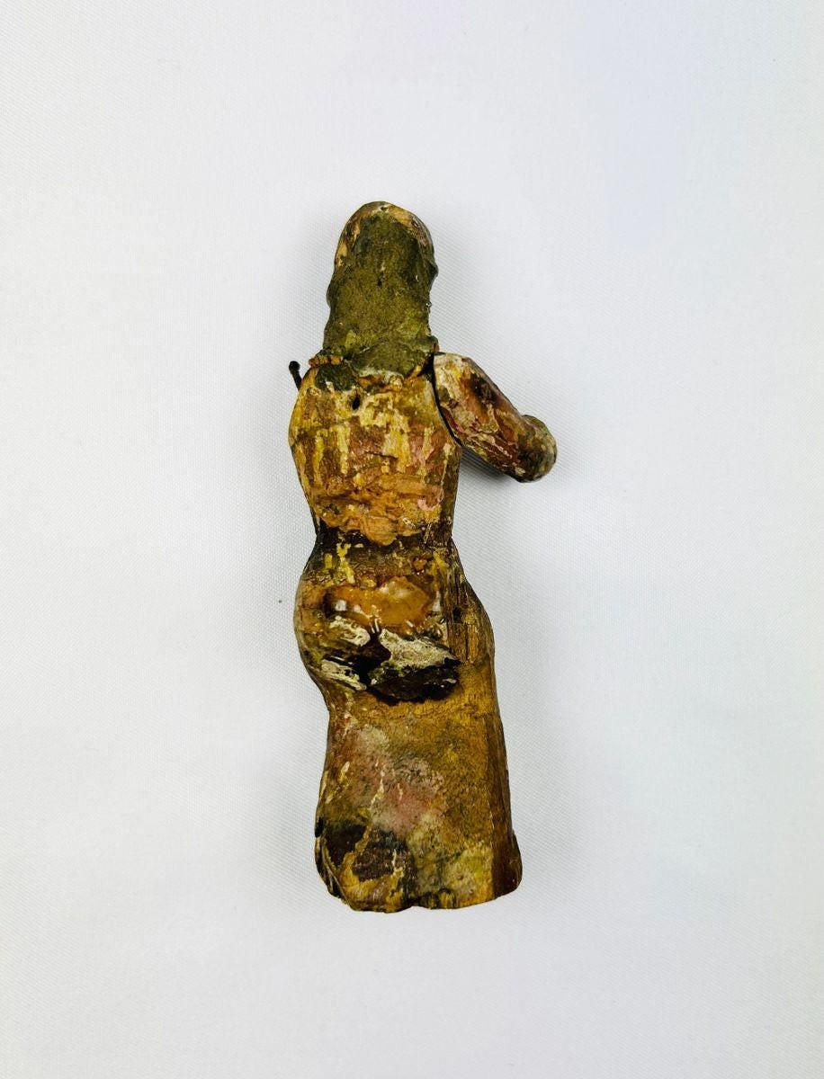 Antique Spanish Colonial religious wood sculpture from Latin America with traces of painted decoration