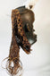 Central African Chokwe wooden mask featuring wickerwork fiber adornments