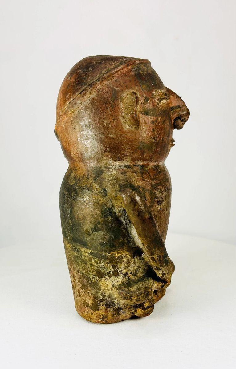 Pre-Columbian anthropomorphic terracotta vessel — side profile showing molded hands and ceremonial figure, ancient effigy pottery at Relic and Rarity