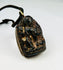 Bronze Buddha reliquary pendant with original leather cord and patina