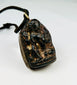 Bronze Buddha reliquary pendant with original leather cord and patina