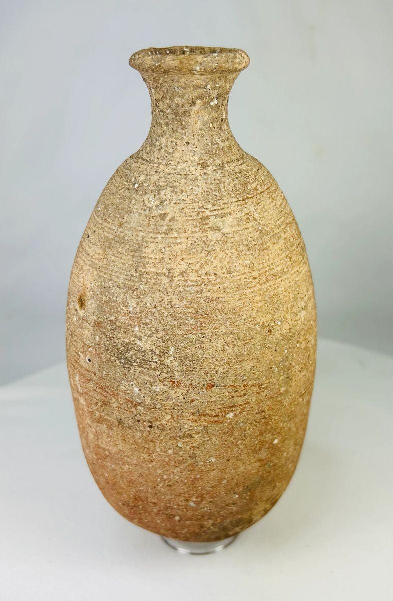 Front view of an ancient Greco-Roman terracotta amphora used for storage