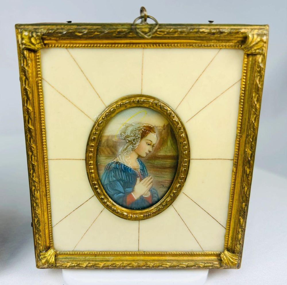 Antique European devotional miniatures showing Marian imagery, hand-painted detail