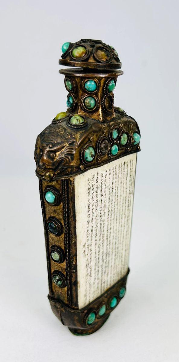 Sino-Tibetan Buddhist ritual object in bronze with green stone inlays and aged patina, late Qing Period