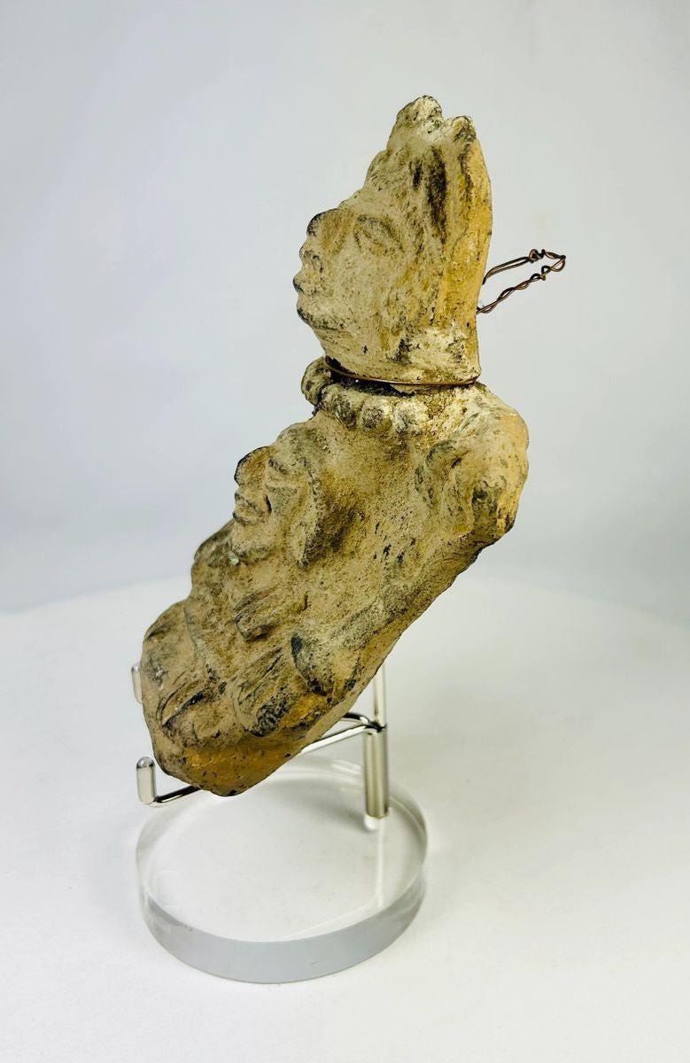 Detail of seated lower figure on a Pre-Columbian Veracruz effigy