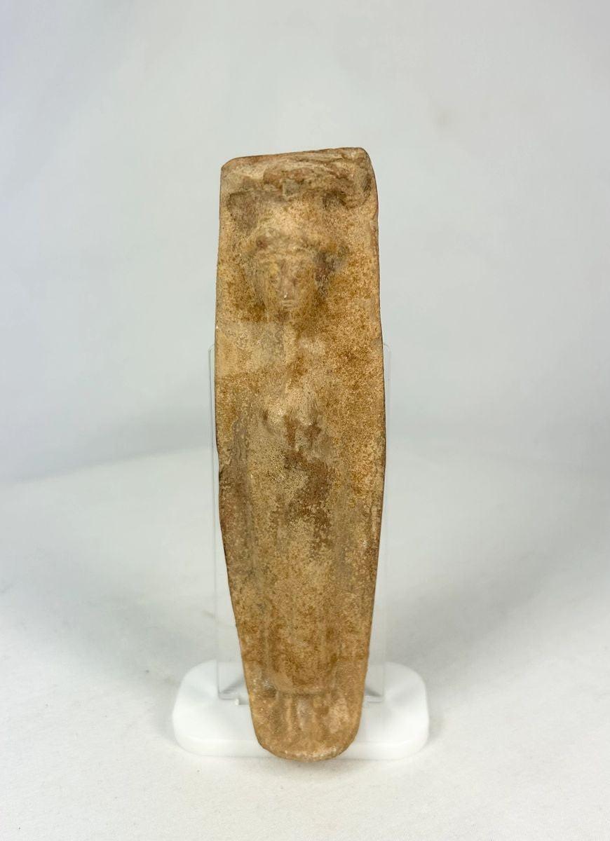 Front view of an Ancient Roman fertility pottery figure with stylized form