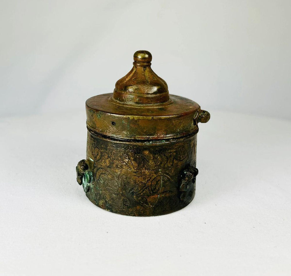 10th–12th century Khorassan bronze inkwell used by scholars, decorated with intricate Islamic metalwork