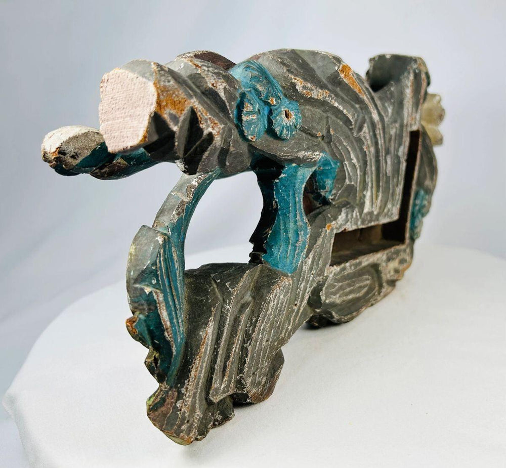 Antique Chinese temple fragment featuring a hand-carved wooden Qilin from the Qing period
