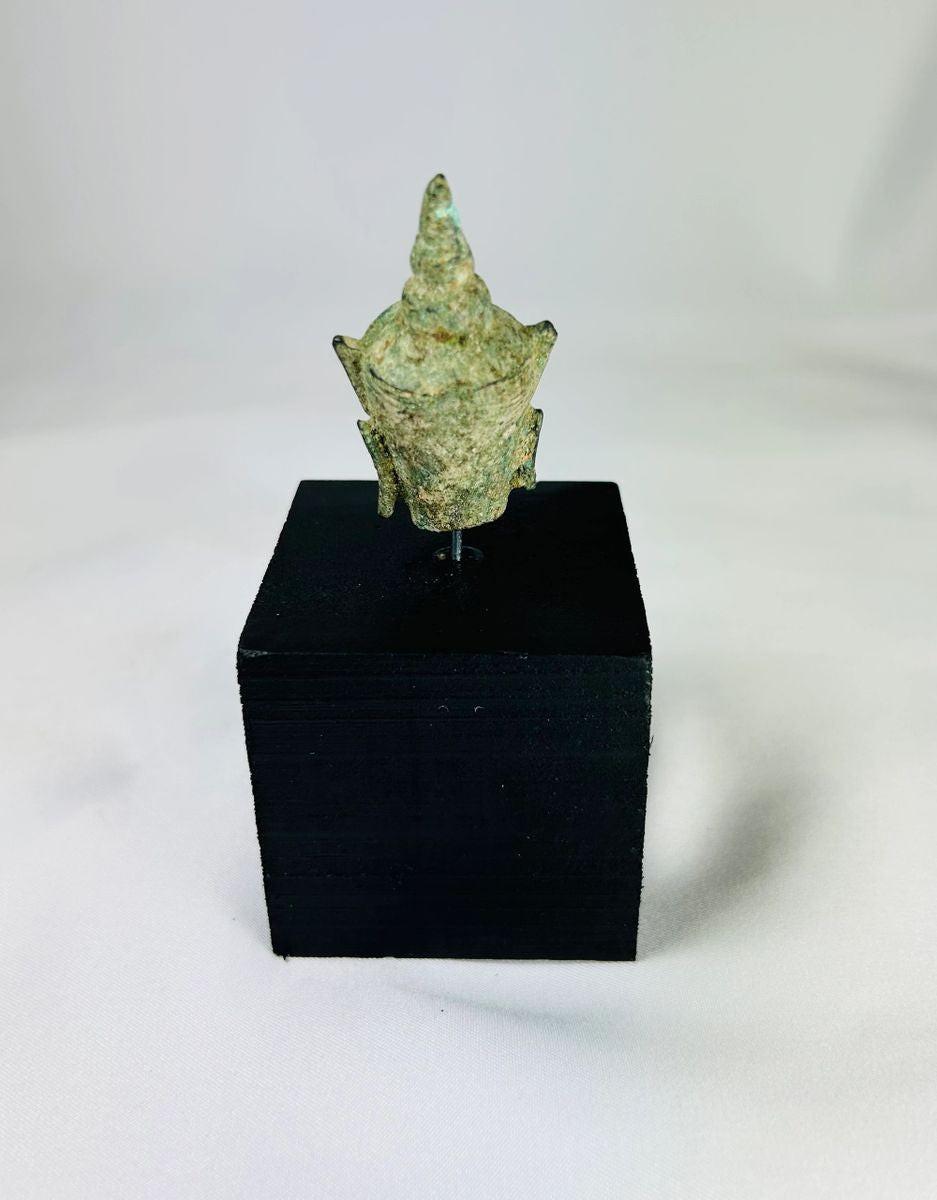 Antique bronze Buddha head elongated earlobes pointed ushnisha green patina