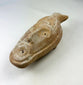 Ancient Byzantine terracotta lamp with detailed human facial spout