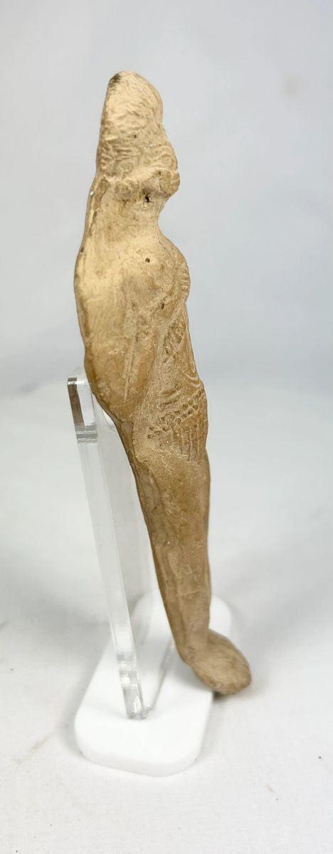 Angled view of Roman terracotta fertility icon used in household shrines and offerings.