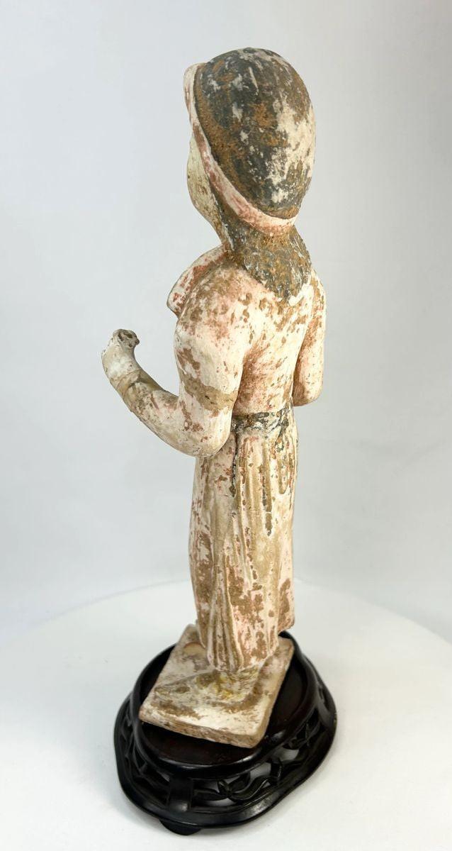 Ancient Chinese Tang Dynasty mingqi figure depicting a female attendant in flowing court robes