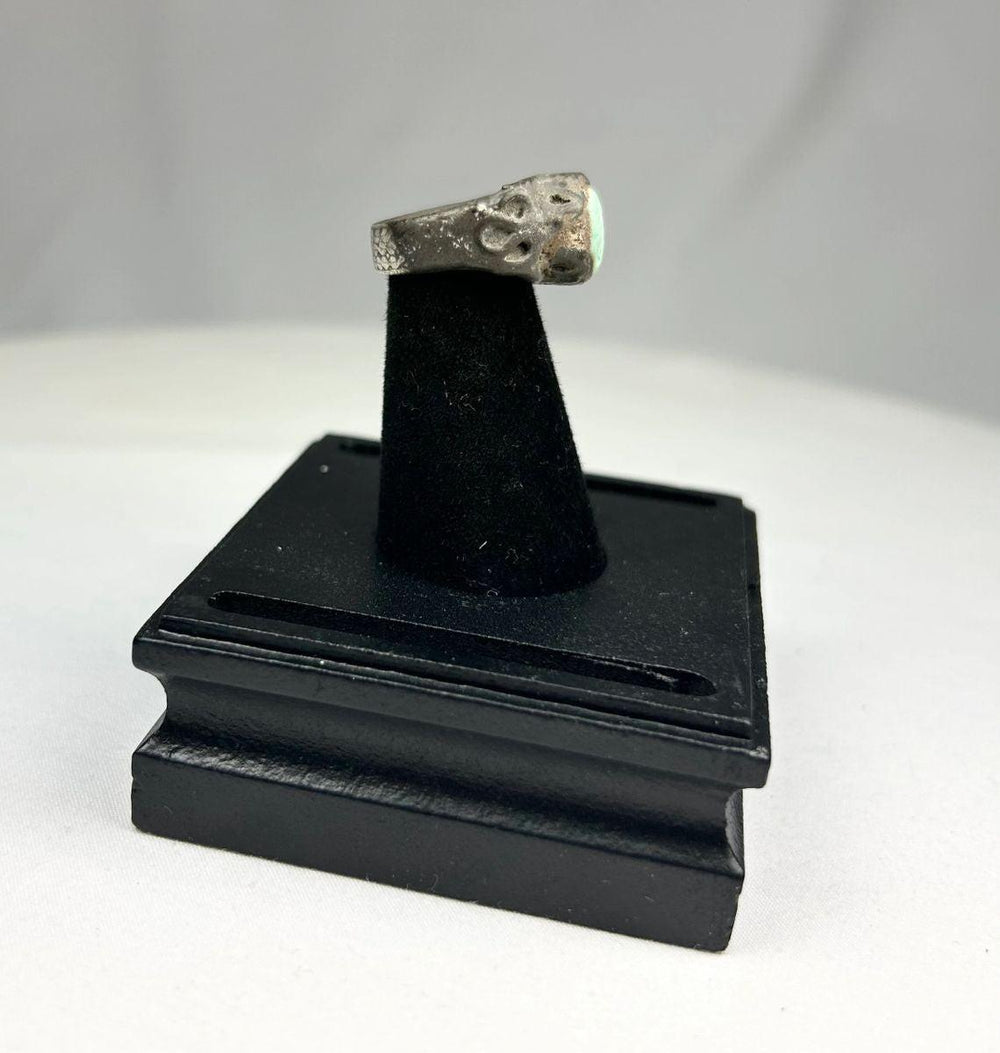 9th–7th century BCE Assyrian silver ring showcasing craftsmanship and spiritual symbolism