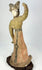 Chinese Tang Dynasty terracotta dancer mounted on later wooden base, with burial patina