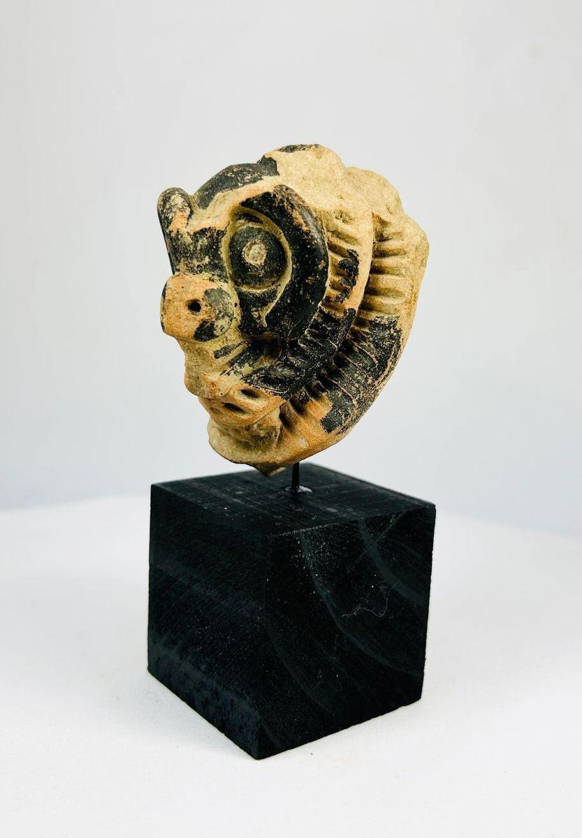 Classic Period terracotta mask fragment showcasing Mesoamerican craftsmanship