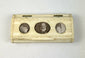 Hand carved Victorian bone snuff box with three early photographic portraits beneath glass