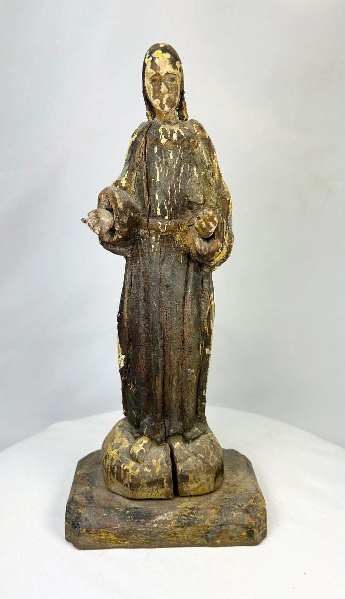 Front view of an 18th–19th century Spanish Colonial santo devotional wooden figure