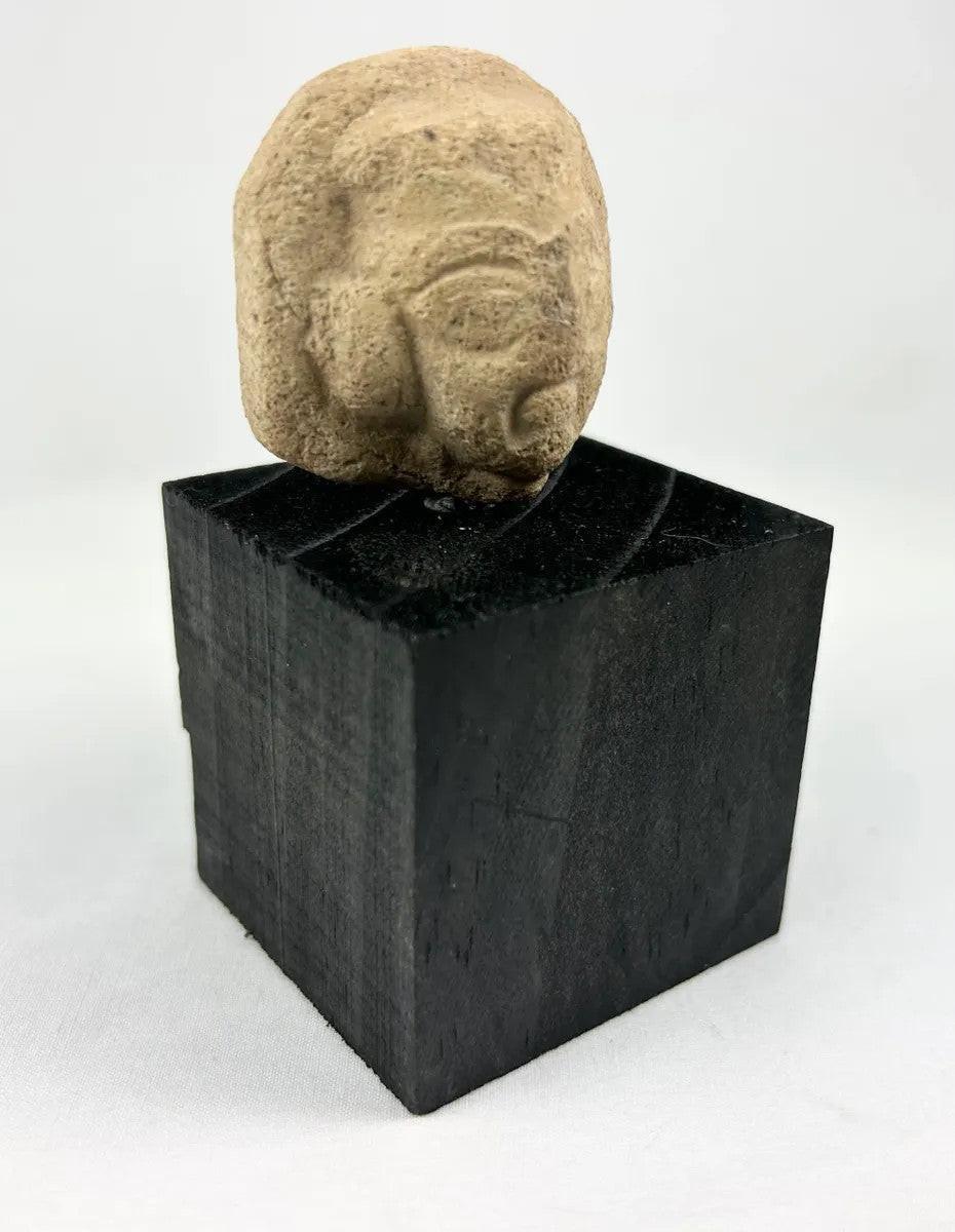 Ancient Near Eastern terracotta head fragment depicting a bearded male figure