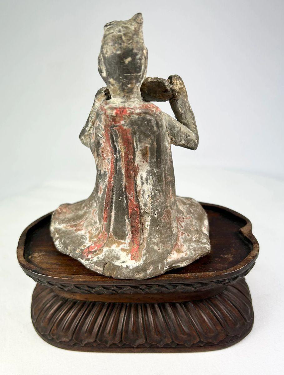 Tang Dynasty Chinese terracotta figure of female court musician on stand