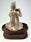 Tang Dynasty Chinese terracotta figure of female court musician on stand