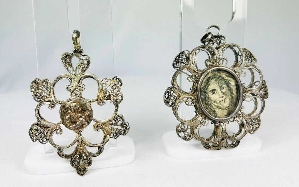 Ornate silver filigree Catholic pendant with 19th-century engraving