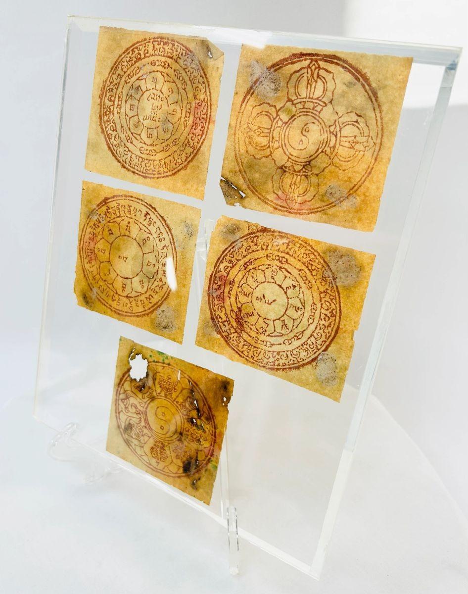 Himalayan Tibetan yantras with mandala-style layouts, lotus motifs, and ritual symbolism