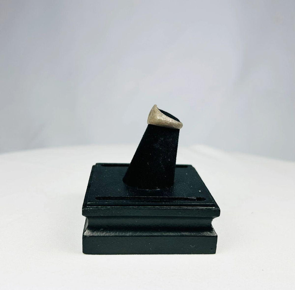 Early Byzantine silver signet ring with sunburst design and worn patina