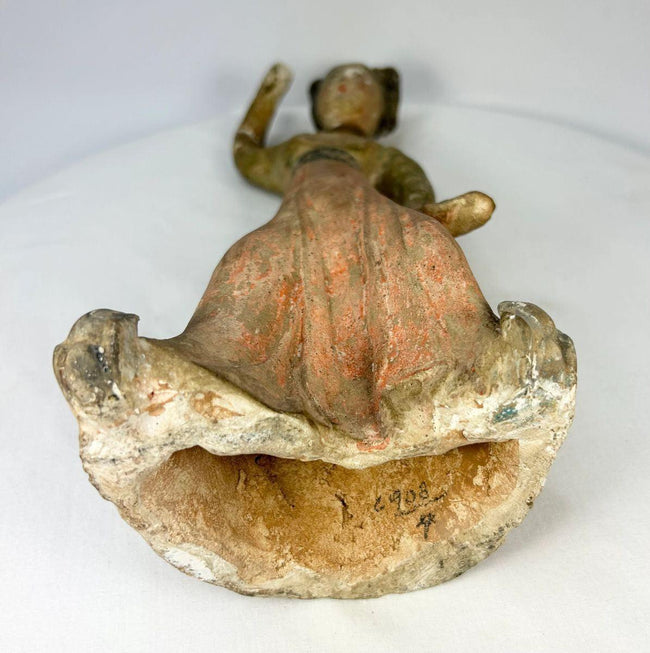 Tang Dynasty funerary dancer sculpture with mineral pigment remnants and kiln-stacked underside