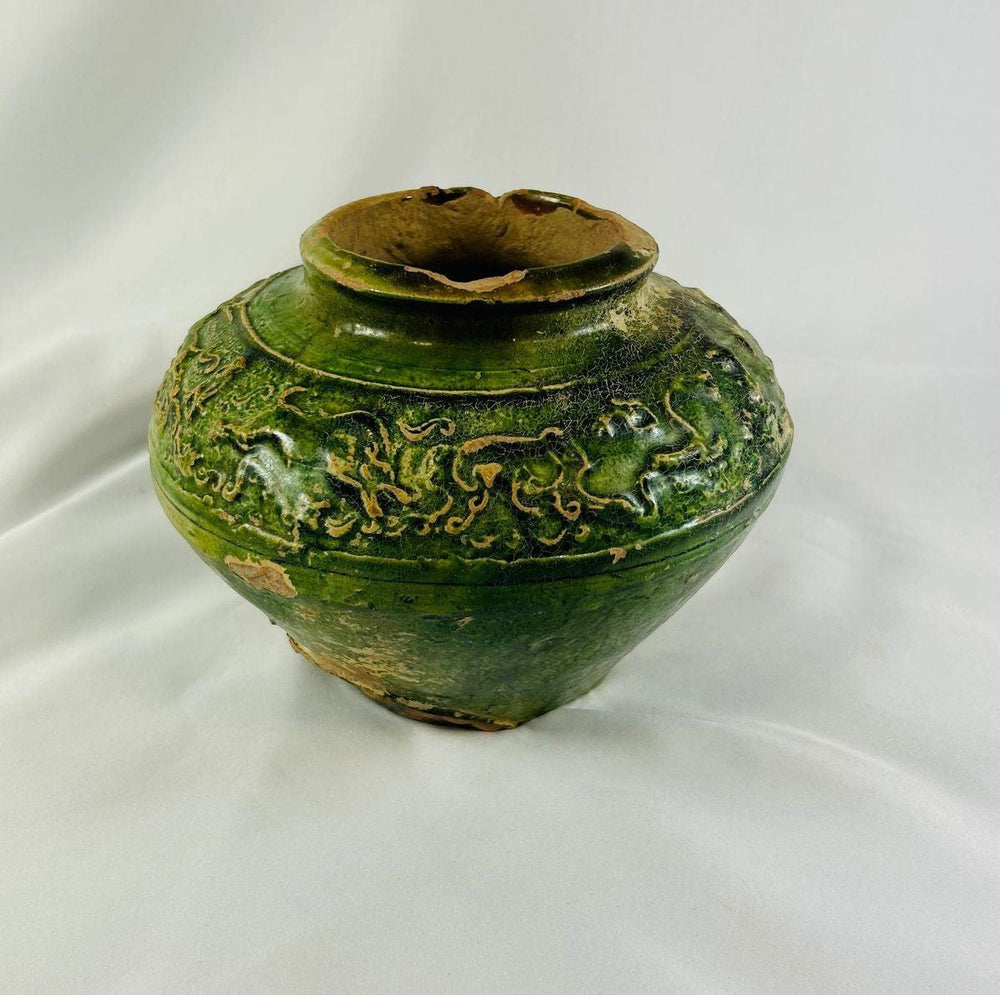 Full-body image of early imperial Chinese green-glazed ceramic jar, circa 206 BCE–220 CE.