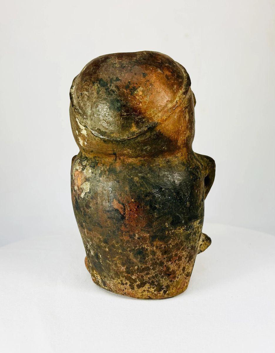 Pre-Columbian terracotta effigy vessel — back view of ancient seated human figure, weathered ceremonial pottery, Relic and Rarity artifact