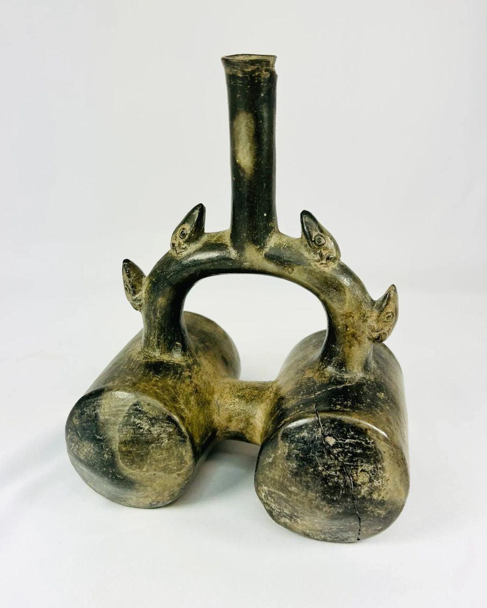 Authentic Chimu stirrup vessel with double chambers and sculpted spouts