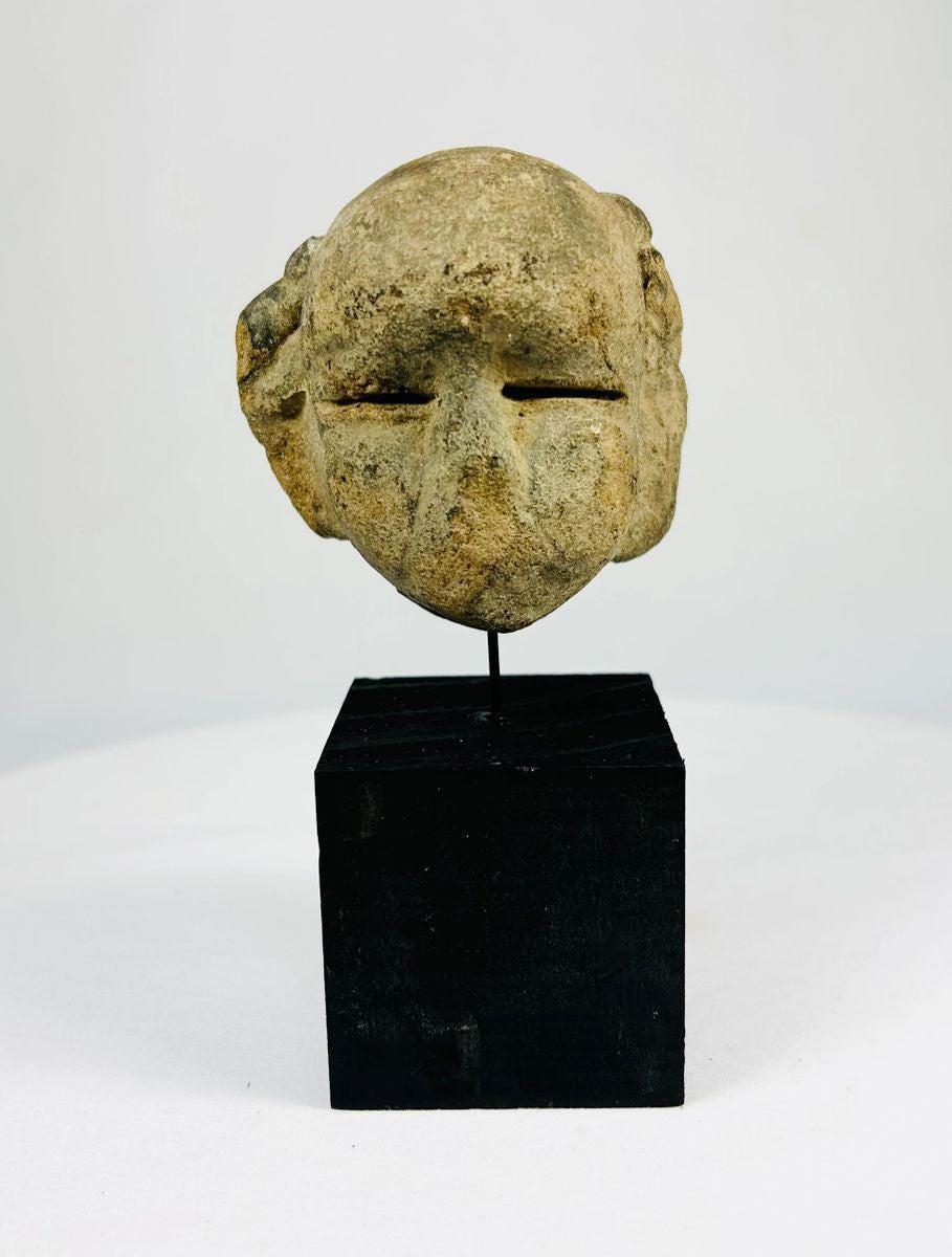 500 BCE–500 CE Mesoamerican stone mask with simple geometric features