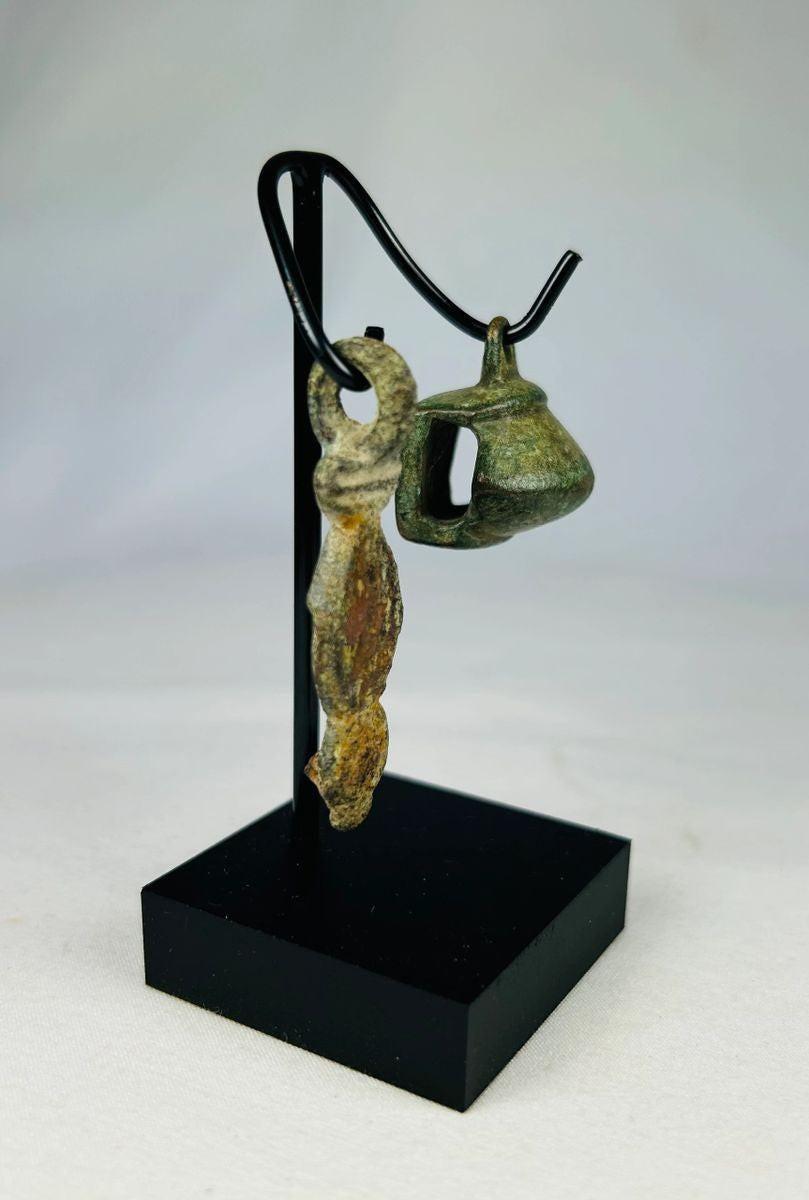 Authentic Ancient Roman bronze pendant and bell reflecting everyday life and ritual use