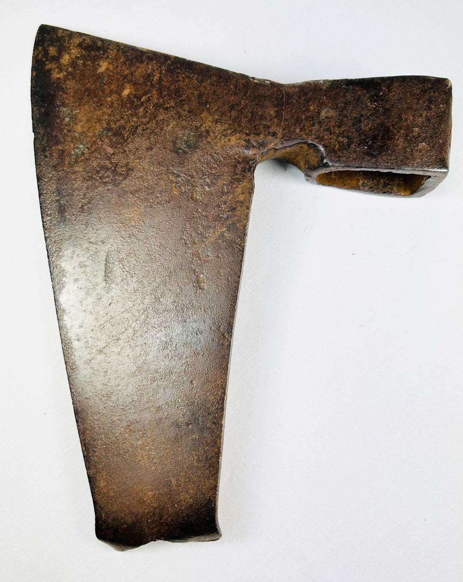 Early 1800s European fishtail goosewing axe, a traditional carpenter’s tool with broad forged blade and historic wear