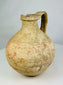 Greco-Roman period Egyptian jug with rounded body and spouted rim