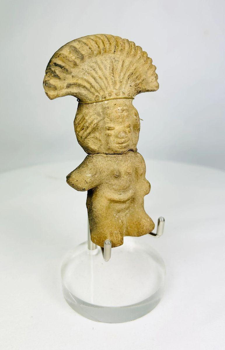 Front view of a Mesoamerican Pre-Columbian terracotta figurine with expressive facial features