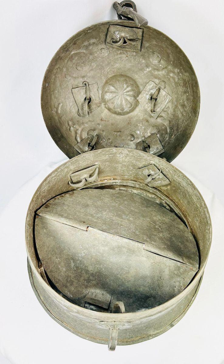 Historic Indo-Persian incense burner showing engraved decoration