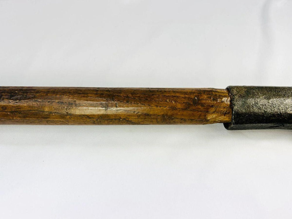 Rare 18th-century European axe with broad curved blade and distinctive forge maker’s stamps.