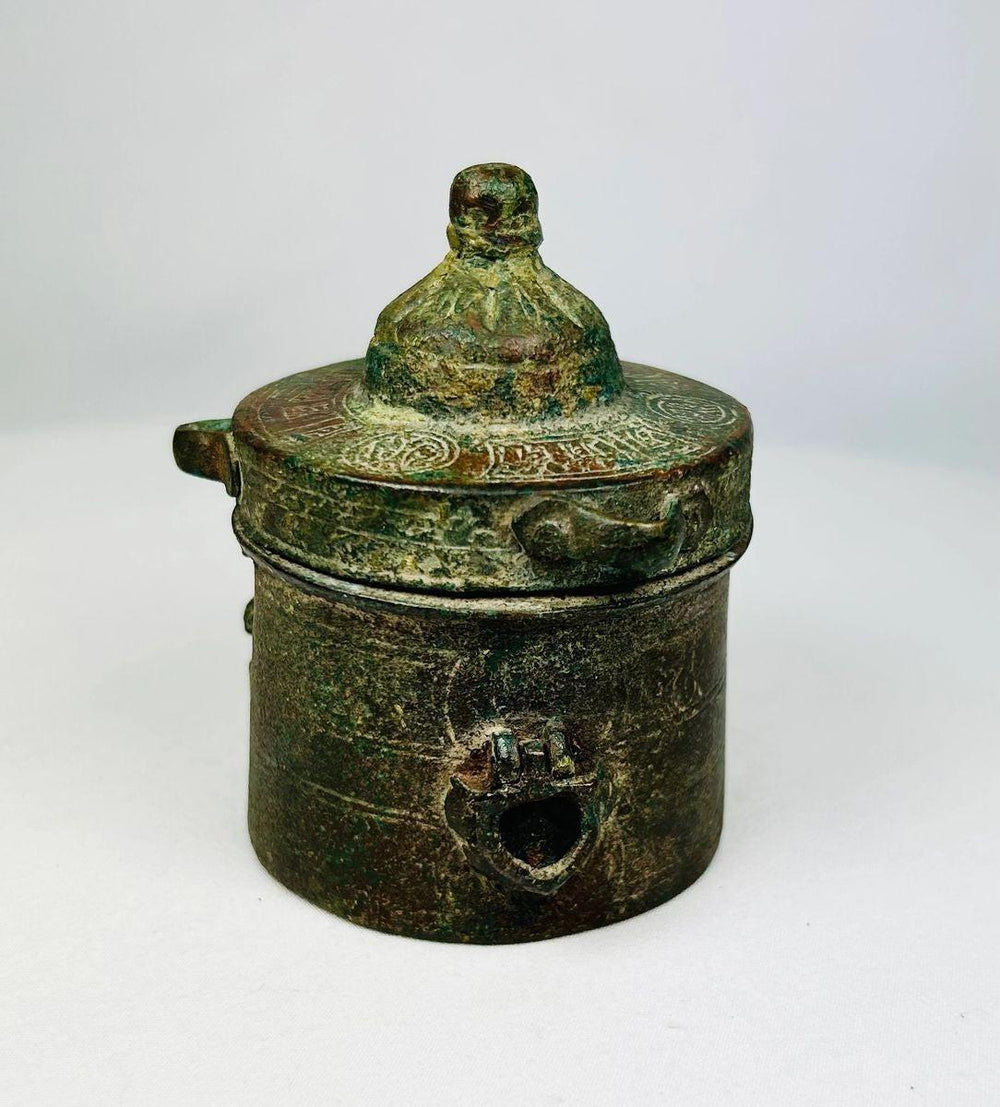 Museum-quality Islamic bronze inkwell from Khorassan photographed against a neutral background
