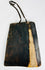 Reverse side of Tibetan devotional plaque revealing natural bone surface and original leather strap