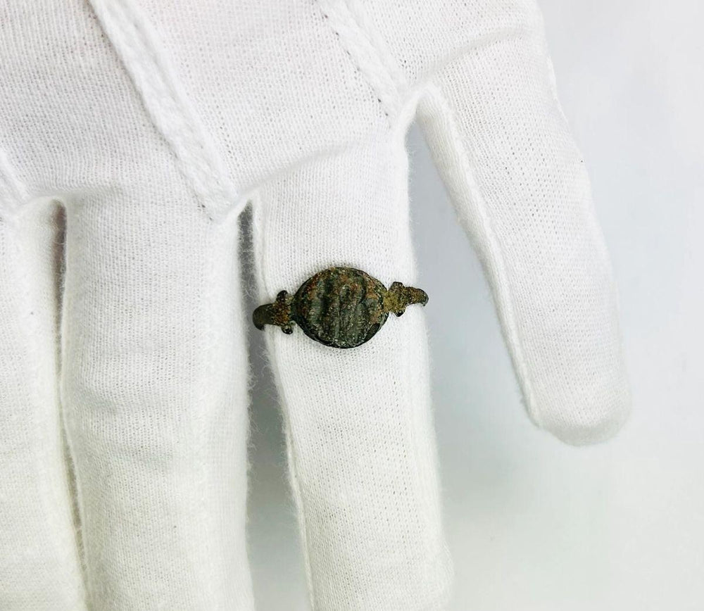 Roman bronze ring personal seal featuring Neptune symbol and maritime motif